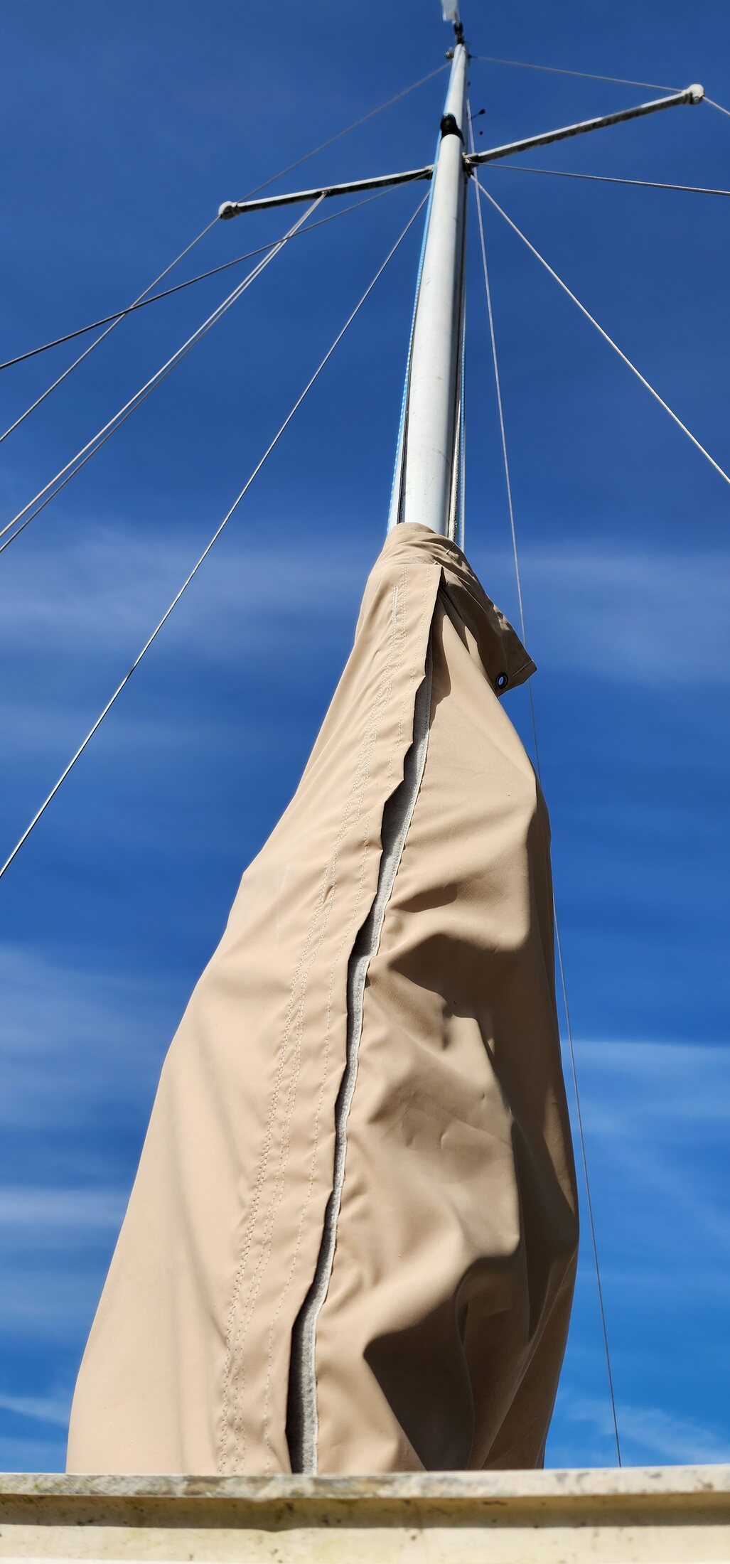View upward along mast and standing rigging