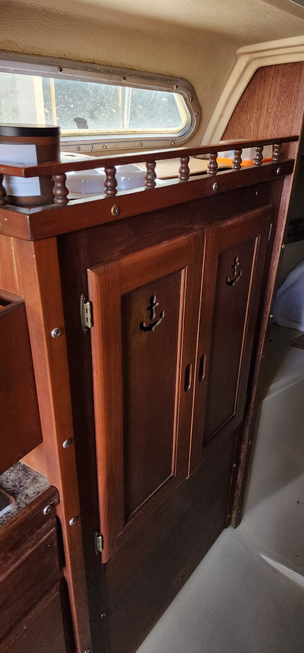Wood storage cabinetry inside Catalina 27